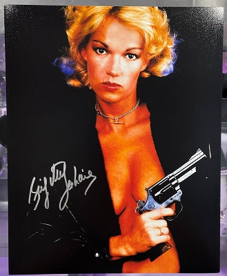 Brigitte Lahaie Autographed Female Executioner 8 in x 10 in Photo
